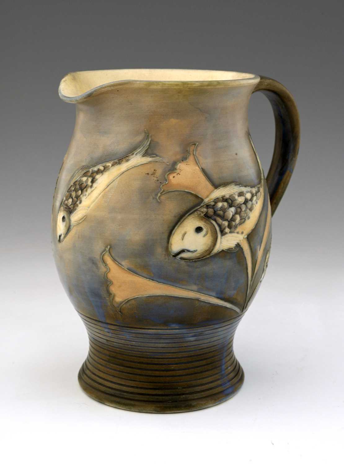 Lot 527 - William Moorcroft, a saltglazed Fish jug,...