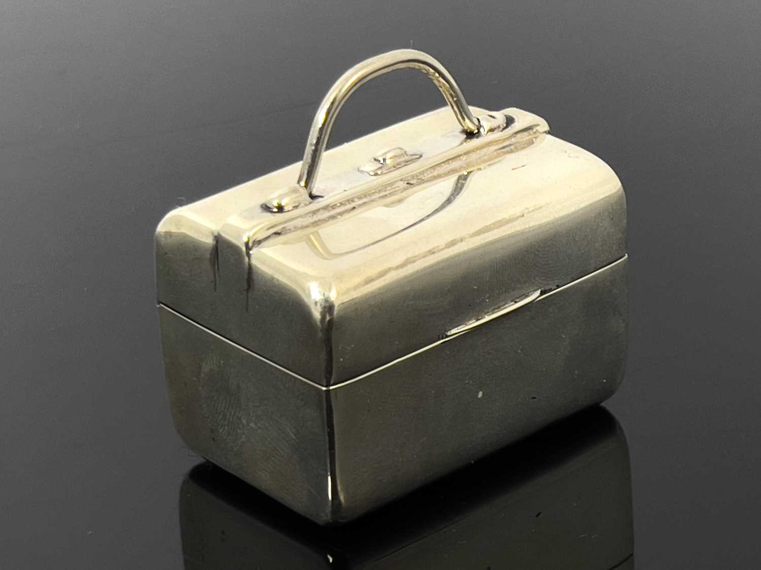 Lot 217 - A Victorian silver novelty pill box,...