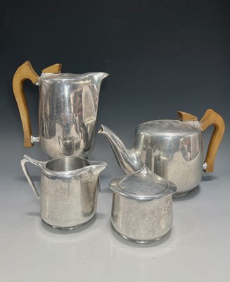 Lot 205 - A four piece Picquot Ware tea set, including...