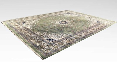 Lot 503 - A large Indo-Persian wool carpet rug, in...