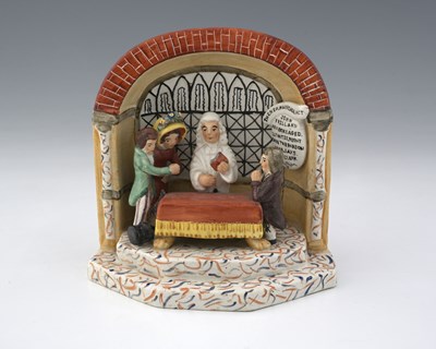 Lot 611 - A Staffordshire pearlware figure group, The...