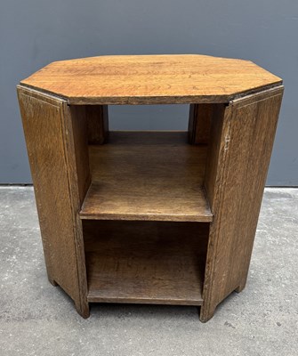 Lot 569 - A Heal's London octagonal oak library table...