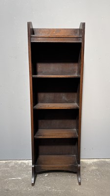 Lot 601 - An early 20th century slim oak bookcase,...