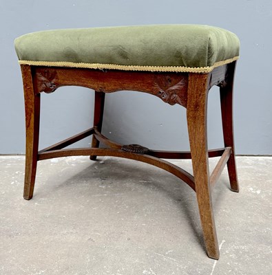 Lot 596 - An Arts and Crafts piano stool after Arthur...