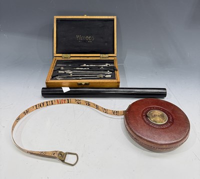 Lot 232 - A John Rabone leather-bound 66ft tape measure,...