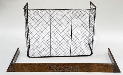 Lot 619 - An Arts and Crafts beaten copper fire curb,...