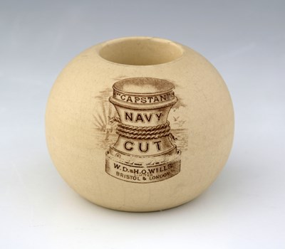 Lot 596 - A buff-coloured stoneware advertising match...