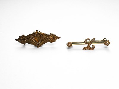 Lot 447 - Two gold split pearl brooches