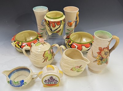 Lot 57 - A Clarice Cliff Waterlily milk jug and sugar...