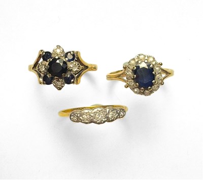 Lot 431 - An 18ct gold diamond five-stone ring, and two 9ct gold rings