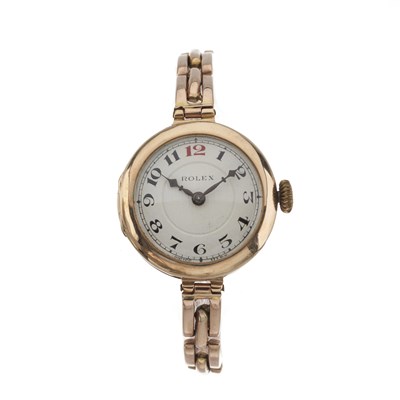 Lot 259 - Rolex, a rose metal bracelet watch