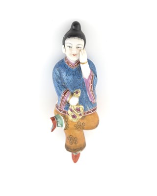 Lot 344 - A Chinese polychrome figural snuff bottle,...