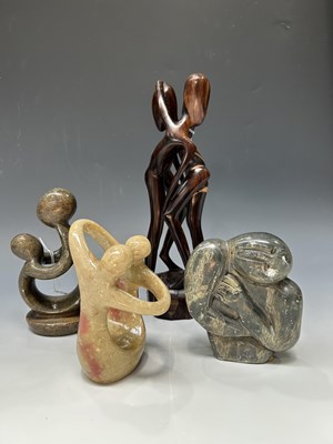 Lot 116 - Three carved statues in the naive style,...