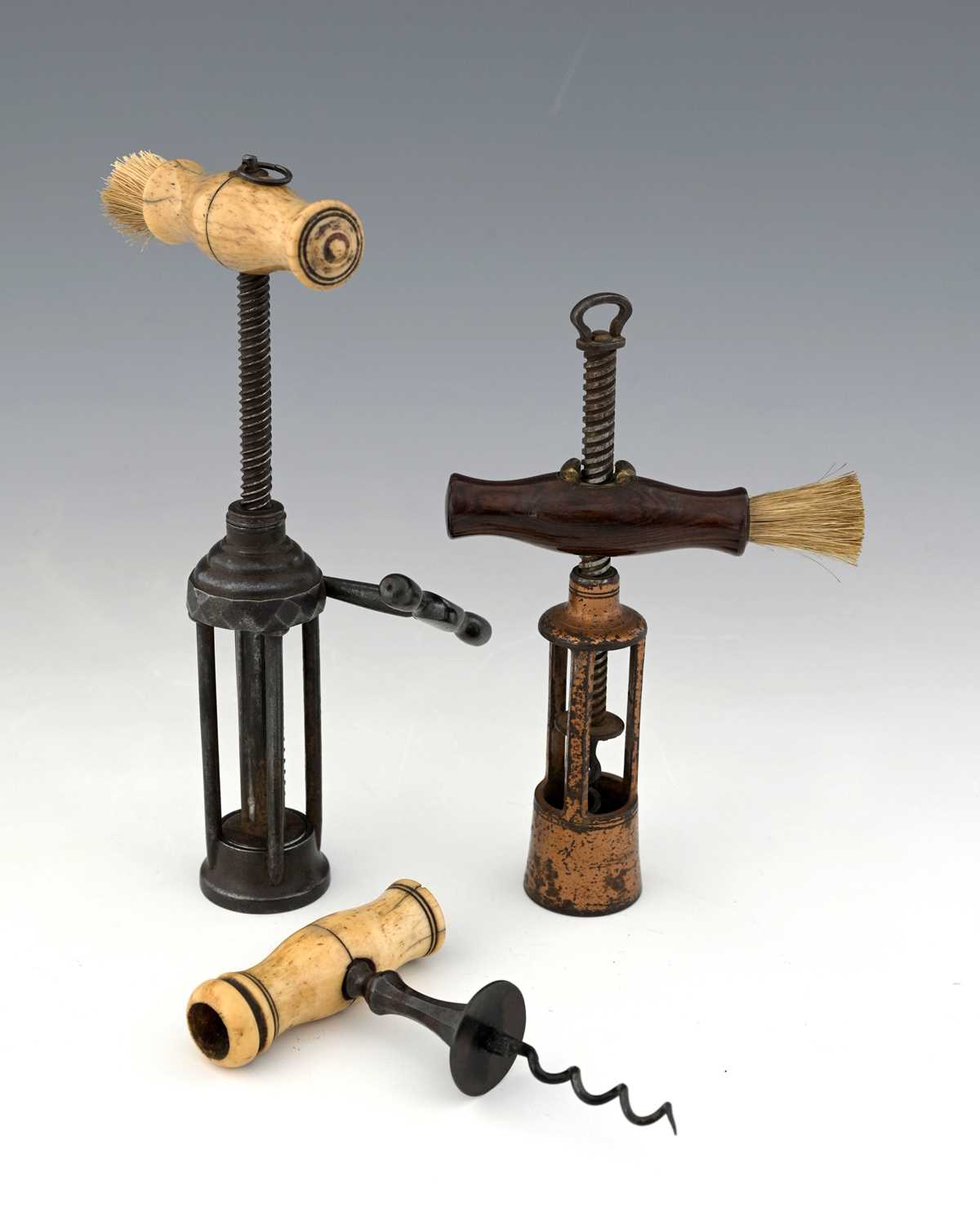 Lot 143 - Three 19th century corkscrews, G Twigg's...