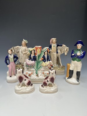 Lot 118 - A collection of Staffordshire figures and...