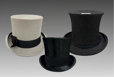 Lot 16 - A Herbert Johnson black silk top hat with...