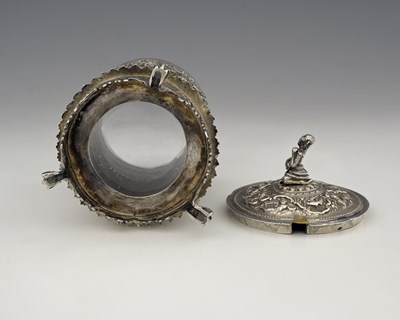 Lot 59 - A Burmese silver-coloured metal jar and cover...