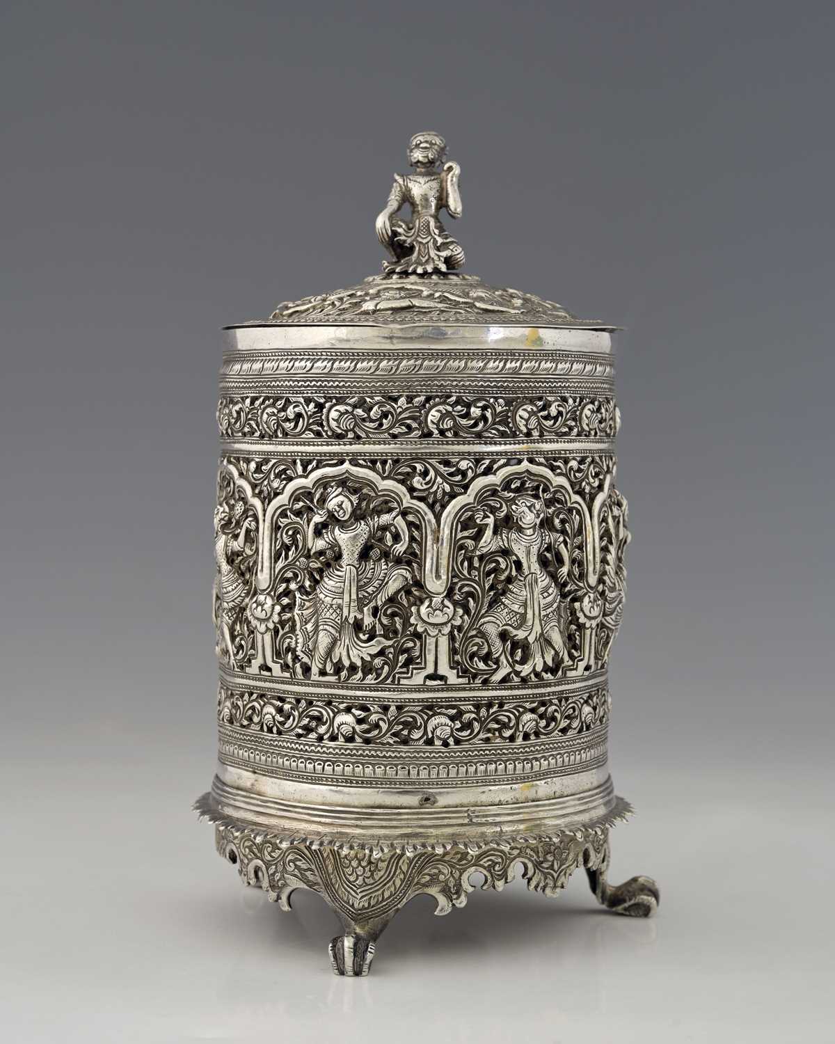 Lot 59 - A Burmese silver-coloured metal jar and cover...
