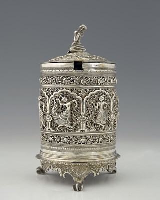 Lot 59 - A Burmese silver-coloured metal jar and cover...