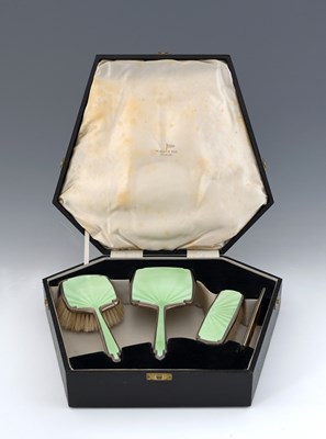 Lot 81 - An Art Deco silver and enamelled dressing...