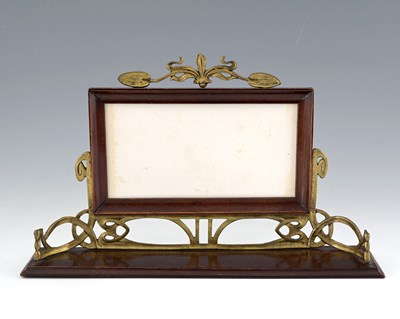 Lot 108 - An Art Nouveau gilt metal and mahogany desk...