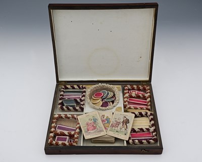 Lot 198 - A mahogany cased parlour game, circa 1830, the...