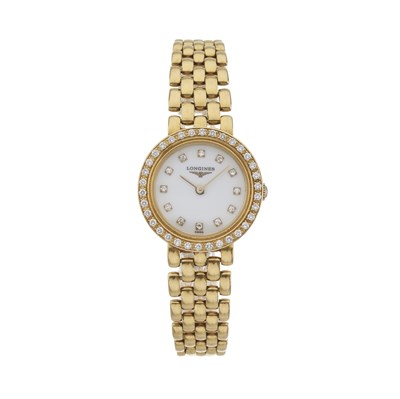 Lot 242 - Longines, an 18ct gold factory diamond set Prestige bracelet watch