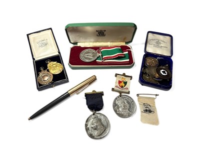 Lot 501C - A Parker pen, a George V 9ct gold sporting...