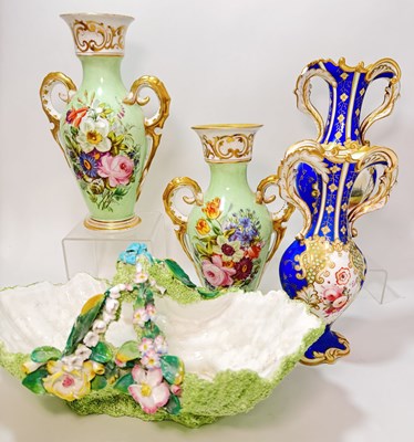 Lot 81 - Two Coalport or Rockingham type twin handles...