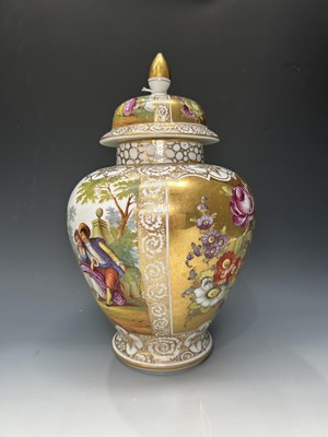 Lot 137 - A continental lidded urn or vase, baluster...