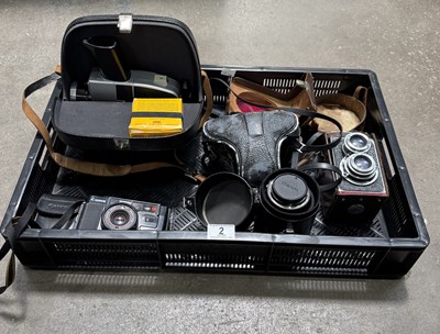 Lot 2 - A Canon AE-1 35mm SLR, together with other...