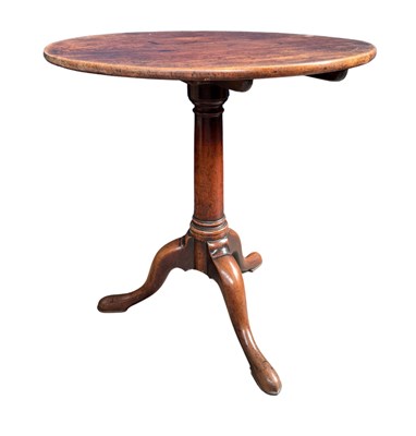 Lot 551 - A George II mahogany tilt top tripod table on...