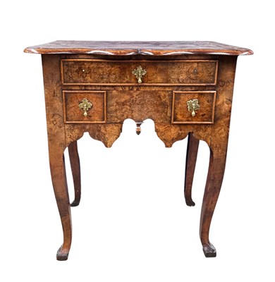 Lot 579 - A George 1 walnut lowboy, on slight cabriole...