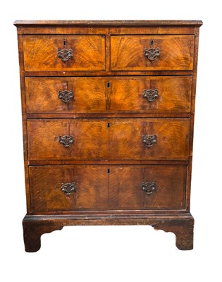 Lot 576 - A mid 18th century walnut and mahogany chest...