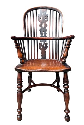 Lot 605 - A 19th century elm seated high back Windsor...