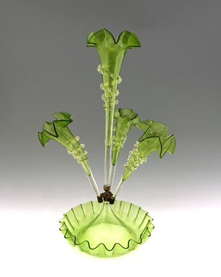 Lot 399 - A Victorian green glass epergne, probably...
