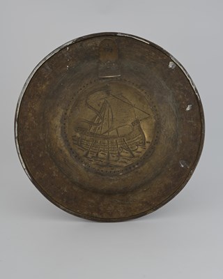 Lot 95 - An Arts and Crafts brass charger, repousse...