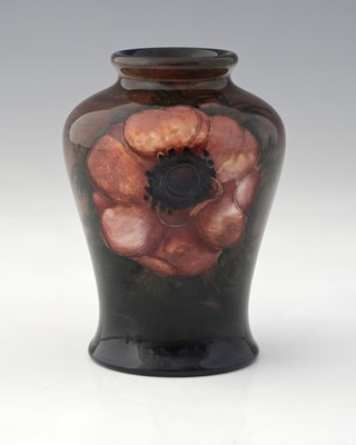 Lot 529 - William Moorcroft, a small Flambe Anemone vase,...