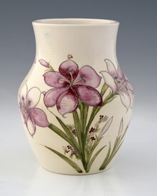Lot 532 - William Moorcroft, a matt salt glazed Freesia...