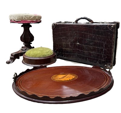 Lot 611 - A vintage crocodile skin suitcase, approx...