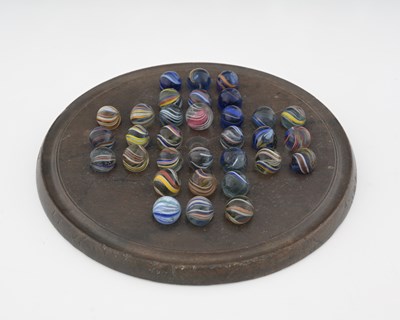 Lot 185 - A collection of 32 Victorian glass marbles, on...
