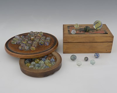 Lot 186a - A collection of 32 Victorian glass marbles on...