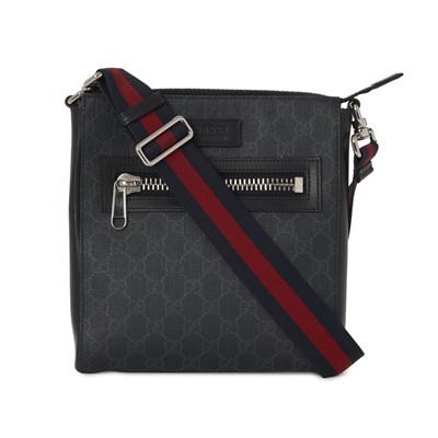 Lot 404 - Gucci, a Supreme messenger bag.