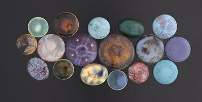 Lot 513 - Ruskin Pottery, a collection of seventeen...