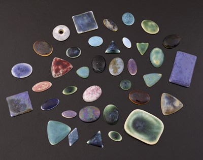 Lot 521 - Ruskin Pottery, a large collection of cabochon...