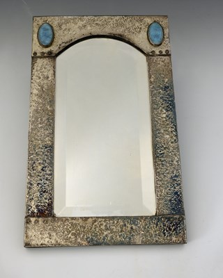 Lot 115 - An Arts and Crafts silvered copper and Ruskin...