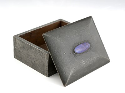 Lot 100 - An Arts and Crafts pewter and Ruskin set box,...