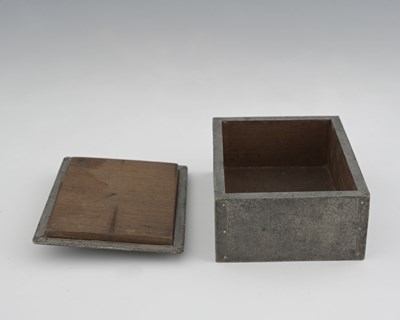 Lot 100 - An Arts and Crafts pewter and Ruskin set box,...
