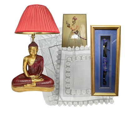 Lot 29 - A table lamp formed as a seated Buddha by...