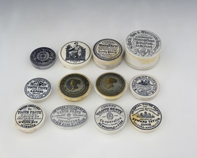 Lot 179A - A collection of various toothpaste pot lids,...